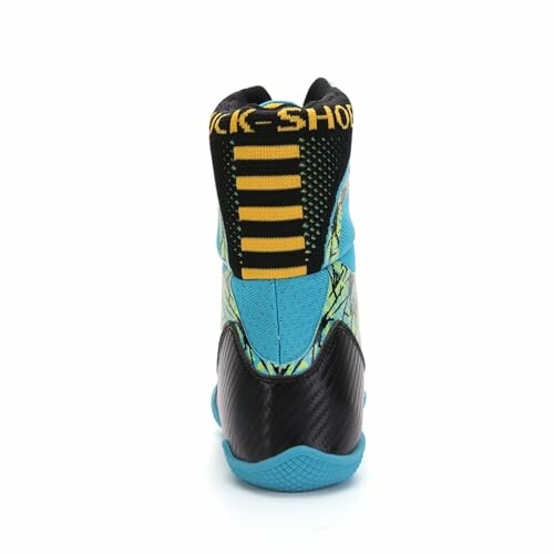 Back view of a blue and yellow sneaker with black accents.